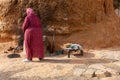 06.11.26 Sahara, Tunisia: Berber woman in traditional clothes bake bread at home. Native Local Tunisian People