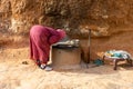 06.11.26 Sahara, Tunisia: Berber woman in traditional clothes bake bread at home. Native Local Tunisian People