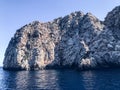 Said to the sea. blue expanse of water. a mountain of sand, stones, a gorge in the vast sea. seaside resort, travel, active Royalty Free Stock Photo