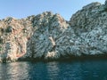 Said to the sea. blue expanse of water. a mountain of sand, stones, a gorge in the vast sea. seaside resort, travel, active Royalty Free Stock Photo