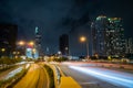 Saigon Cityscape Nighttime. Urban Metropolis with illuminated road and Bitexco Financial Tower at Background. Saigon Royalty Free Stock Photo