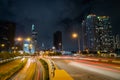 Saigon Cityscape Nighttime. Urban Metropolis with illuminated road and Bitexco Financial Tower at Background. Saigon Royalty Free Stock Photo