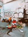 Saigon, Vietnam, A group of local Vietnamese women street vendor selling fruits in the baskets on the streets o Royalty Free Stock Photo