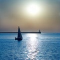 Sail boat against sunset Royalty Free Stock Photo