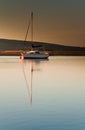 Sail boat in dawn light Royalty Free Stock Photo