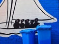 Sail Boat Graffiti Art and Blue Trash Bins, Sydney, Australia