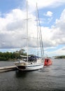 Sail boat moored at Strandvagen embankment of Stockholm Harbor, Sweden Royalty Free Stock Photo