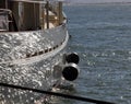 Sail boat with ocean glistening reflection