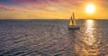 Sail boat on the ocean during sunset Royalty Free Stock Photo