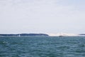 Sail boat sailing in front of Pilat dune Royalty Free Stock Photo