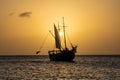 A sail boat silhouette against the sunset Royalty Free Stock Photo