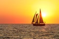 Sail boat silhouette in the sun set at the beach Royalty Free Stock Photo