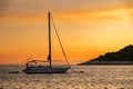 Sail Boat Yacht at Sunset or Sunrise of the Coast of Hvar, Croatia Royalty Free Stock Photo