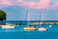 Sail boats docked at the marina at Mackinac Island during sunset Royalty Free Stock Photo