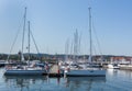 Sail boats and yachts docked at the marina harbour in the Pier Molo at the baltic sea, Sopot, Poland.