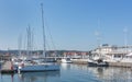 Sail boats and yachts docked at the marina harbour in the Pier Molo at the baltic sea, Sopot, Poland. Royalty Free Stock Photo