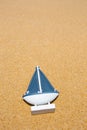 Sail Ship Toy Model in the Beach Sand Royalty Free Stock Photo