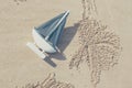 Sail Ship Toy Model in the Beach Sand Royalty Free Stock Photo