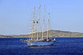 Sail ship and yachts performs maneuvers at open sea and entering into the port . Royalty Free Stock Photo