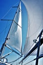 Sail tack with a sailing yacht in the wind with blue sky. Royalty Free Stock Photo