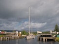 The sail training ketch Ocean Spirit of Moray passes through an open swing bridge on the Caledonian Canal.