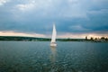 Sail a yacht against the blue sky Royalty Free Stock Photo