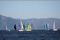 Sail Yacht racing in the Mediterranean sea in Turkey. Several sailing yachts in a beautiful bay. Royalty Free Stock Photo