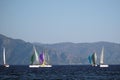 Sail Yacht racing in the Mediterranean sea in Turkey. Several sailing yachts in a beautiful bay. Royalty Free Stock Photo