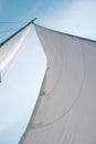 Sail on a yacht in the sea against the blue sky Royalty Free Stock Photo