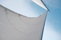 Sail on a yacht in the sea against the blue sky Royalty Free Stock Photo