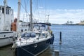 Sail yacht standing moored in the sea port, sailboat harbor Helsinki, Finland.  Modern water transport, lifestyle. Royalty Free Stock Photo