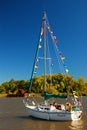 Sailboat adorned with flags
