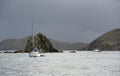 Sailboat at anchor in Manchioneel Bay in front of Cistern Pt., Cooper Island, BVI