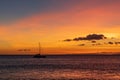 Sailboat anchored in a Maui channel during a beautiful Hawaiian sunset Royalty Free Stock Photo