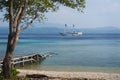 Sailboat Anchored Off of an Indonesian Island Royalty Free Stock Photo