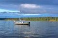 Sailboat anchored upper left Royalty Free Stock Photo