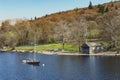 Sailboat anchoring at Lake Windermere in the Lake District National Park, North West England, UK