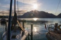 Sailboat on Attersee with Austria Alps at sunrise. Tranquil, yacht sport background Royalty Free Stock Photo