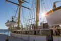 A sailboat with boats. Royalty Free Stock Photo