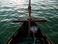 Sailboat bow with mooring rope sailing on the sea waves with turquoise water top view. Atmospheric marine travel photo Royalty Free Stock Photo