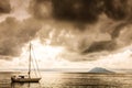 A scene of a sailboat and a mountain in monochrome tone Royalty Free Stock Photo