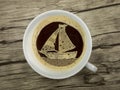 Sailboat in the coffee cup Royalty Free Stock Photo