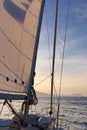 Sailboat crop at sunset ocean Royalty Free Stock Photo