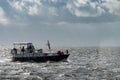Sailboat departs from the port of Nes in Ameland and goes to the Wadden Sea