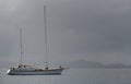 Sailboat dropping its anchor in Manchioneel Bay, Cooper Island, BVI