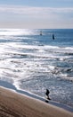 Sailboat floating on the sea shimmering in the sun