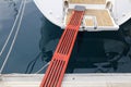 Sailboat gangplank in a harbor