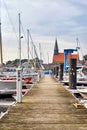 Sailboat harbor on the Baltic Sea. In the background the church of Schaprode. Mecklenburg-Vorpommern, Germany
