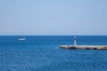 Sailboat and harbor fragment in Rhodes, Greece island.