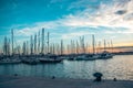 Sailboat harbor in the port evening photo. Beautiful moored sail yachts in the sea Royalty Free Stock Photo